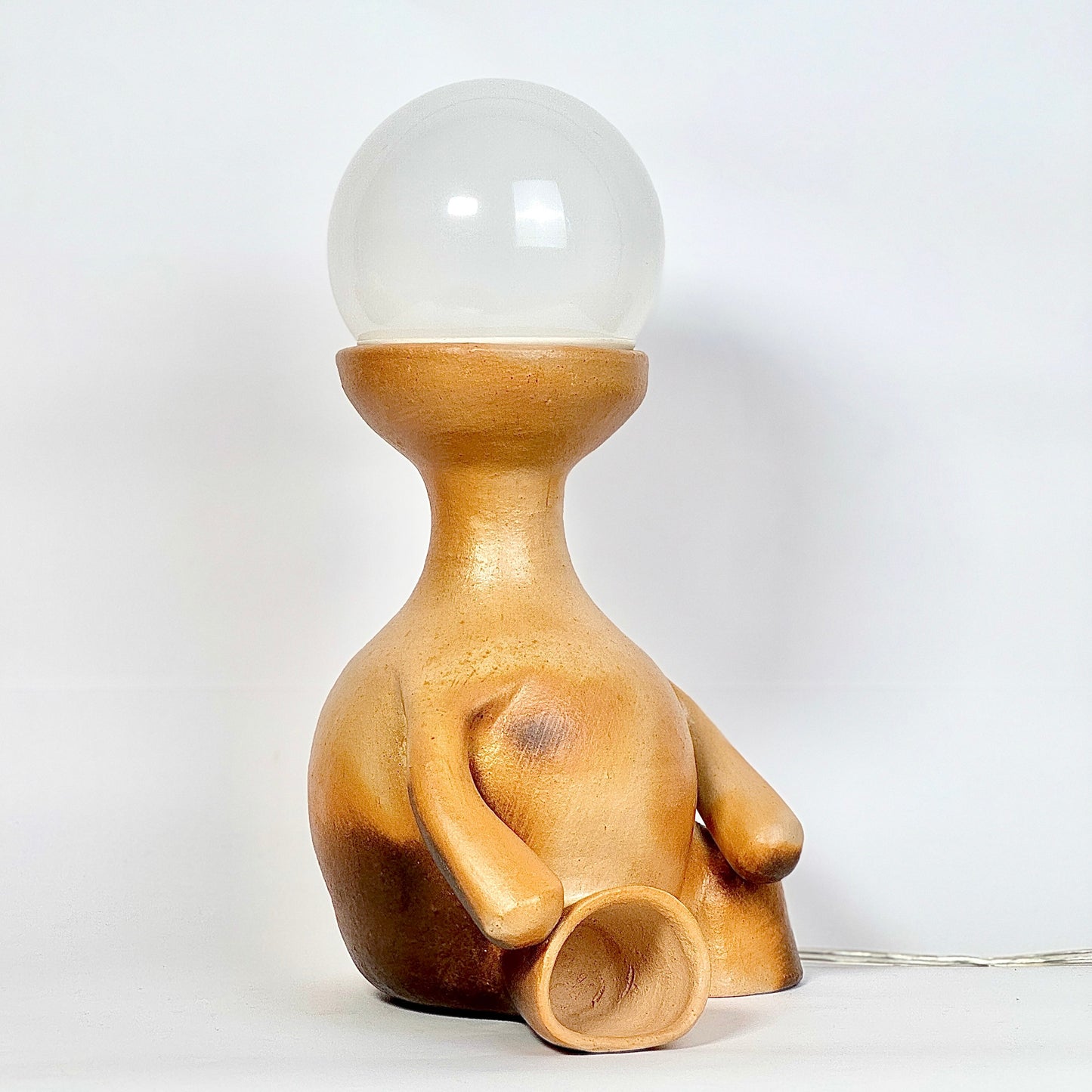 Luminária Pessoa Sentada